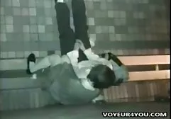 Beauty in pink latex bares elastic milkings and caresses pussy