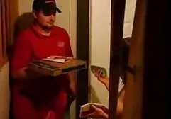 Mulatto in a red dress stuck a vibrator in her pussy