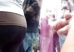 Experienced swinger caresses girl's legs while she sucks his penis