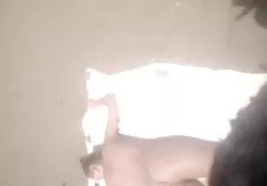 Cute brunette dude pulled on a couch in a leather chair