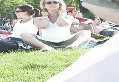 Busty mother talking on the phone with her son and fingering her pussy