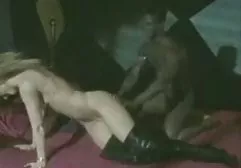 The girl in white stockings with a hairy pussy rides on the penis