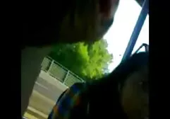 Spreading and showing hairy cunt