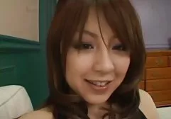 Horny beauty in black stockings fucks herself with a sex toy