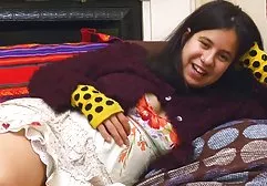 Tanned babes with small tits suck at the guy on the beach