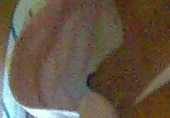 Blonde with elastic boobs stripping in the kitchen to caress herself