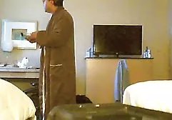 The boy watches his black neighbor sucking the guy