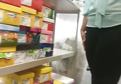 Busty secretary gives the boss a blowjob and jerks the dick between the boobs