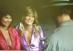 Mistress in high boots and in the skin shows big labia