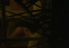 Drunk brunette jerks off naked man