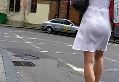 The girl fills the cornflakes with her milk