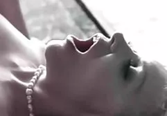 A couple of newlyweds resting on a nudist beach