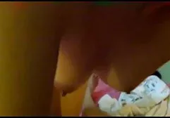 The guy sat down in a chair and gave suck his girlfriend