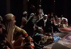 Cheating woman walks to the local nudist beach and watches the naked ladies