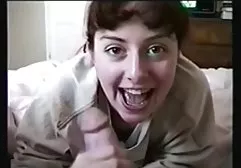 Sultry brunette is smacking on the table with a student