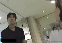 Busty Shmara in red stockings fucks herself with a dildo