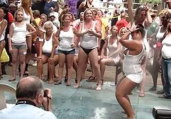 Big breasted beauty entertains a client with other whores