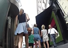 Watch through the camera in the mobile as nudists have fun