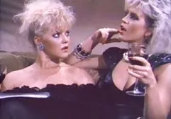 Sexy blonde with big tits poses naked