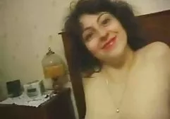 Brunette suck dick to her lover and fucks him on the bed