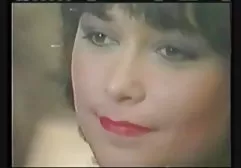 Beautiful girl in a short dress passionately fucks in the park