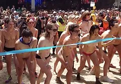 Two lustful lesbians masturbate on a gorgeous bed