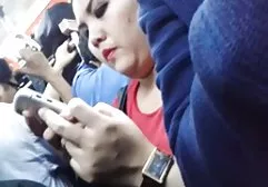 Female in high boots jerking off her clit and pissing