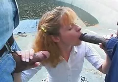 Babe with a beautiful body sucks on strapon