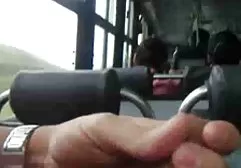 Flexible bodybuilder playing with two guys penises