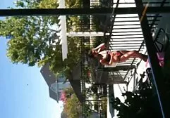 Big breasted kitty in a collar jerks off with a metal phallus