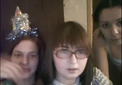 Girl undresses in front of the camera in a public park.