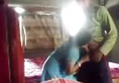 Sexy black woman poses by the pool and then fucks and sucks cock