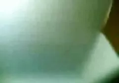 Brunette jerks off guy's dick in the kitchen