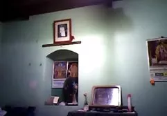 Cheeky chick in latex high boots with heels sits on the throne and masturbates cunt