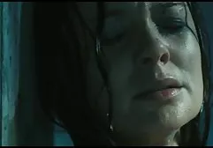 Beautiful brunette in slimming lingerie undresses