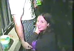 The guy sticks needles in the big ass of a gorgeous girl with silicone tits