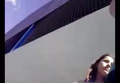 Lesbians in latex piss under a tree in the forest