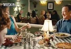 Two young beautiful students help each other wash in the bathroom