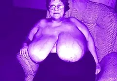 Cute pyshechka gently caresses pink nipples on huge boobs