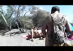 Muscular brunette posing with bare tits and then sucking dick